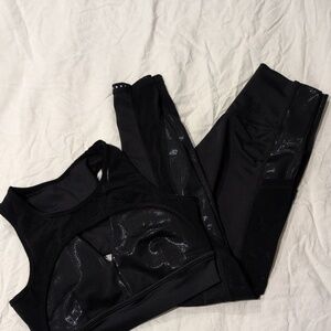 BuffBunny Black Sports Bra with Wide Straps and Breathable Panels